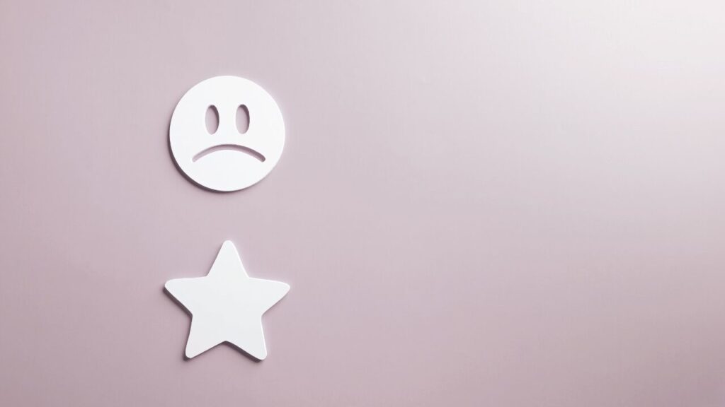 星マークと顔文字のロゴ