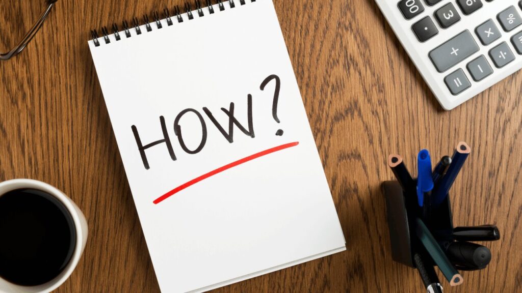 ノートに書かれたHOWの文字